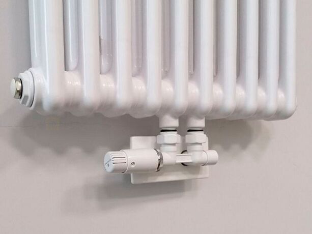 Радіатор з вузлом нижнього підключння Comple Selection