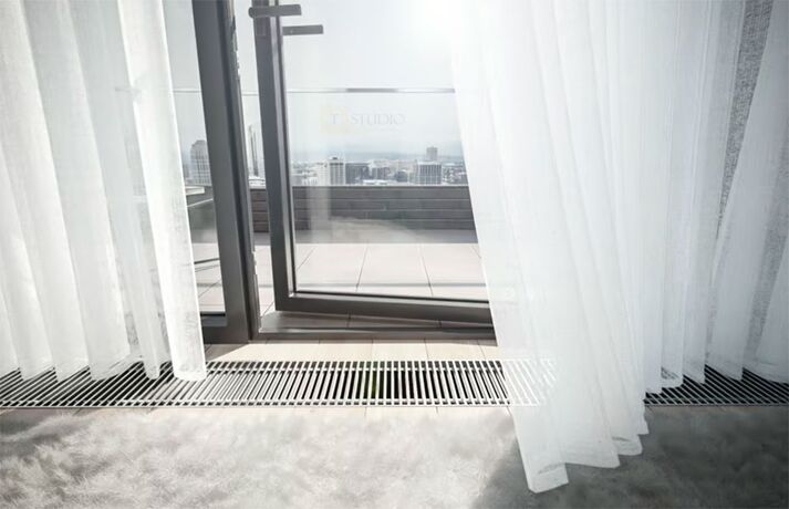 Вбудований у підлогу конвектор Konveka FH4-H біля виходу на балкон